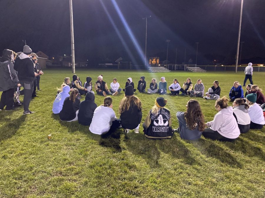 Seniors secret weapon: playing duck duck goose at practice. 