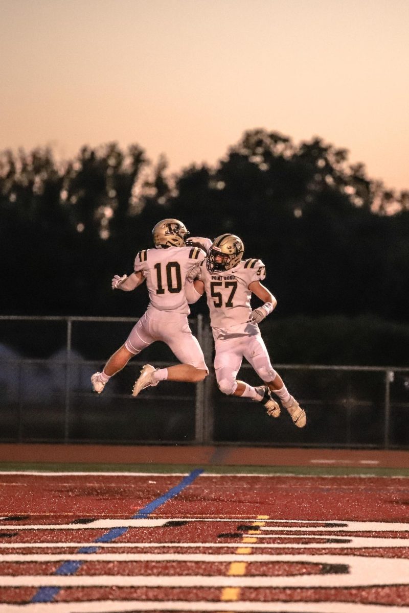 Colin Obser and Tanner Hynes celebrate after Obsers second touchdown of the night.