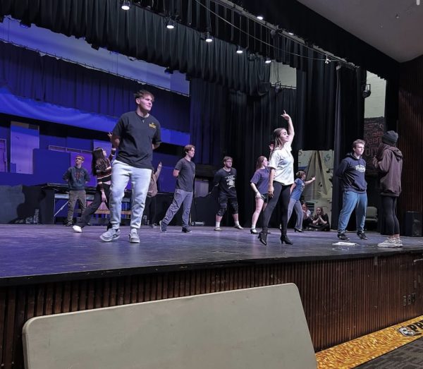 Performers practicing one of their dance numbers.